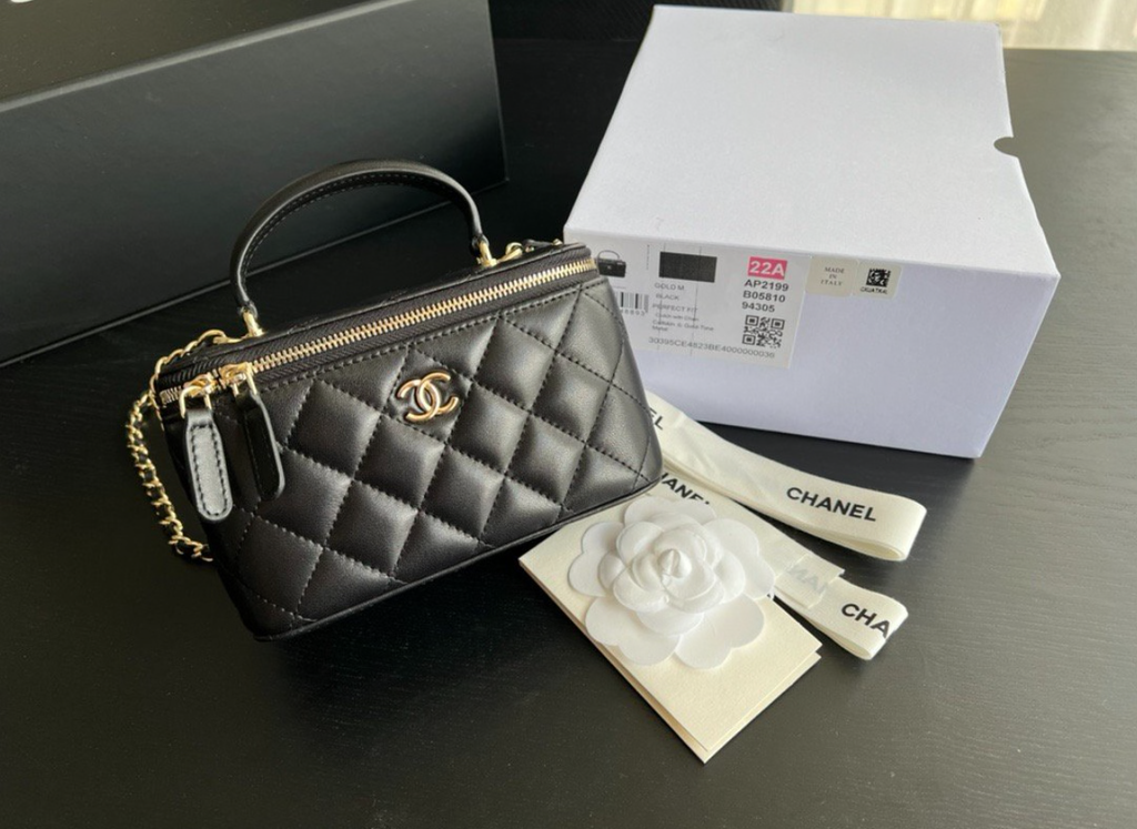 CHANEL Black Quilted Vanity Mini Crossbody with Gold
Hardware
