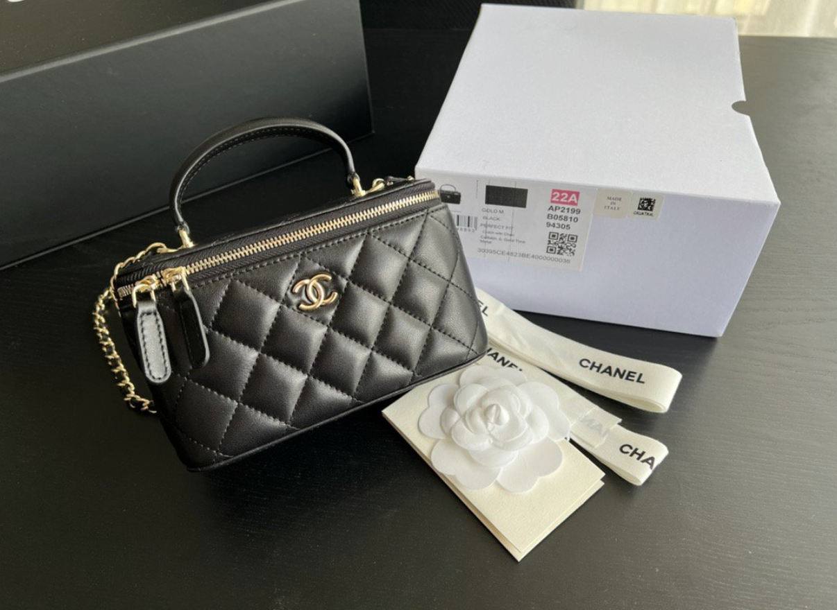 CHANEL Black Quilted Vanity Mini Crossbody with Gold
Hardware