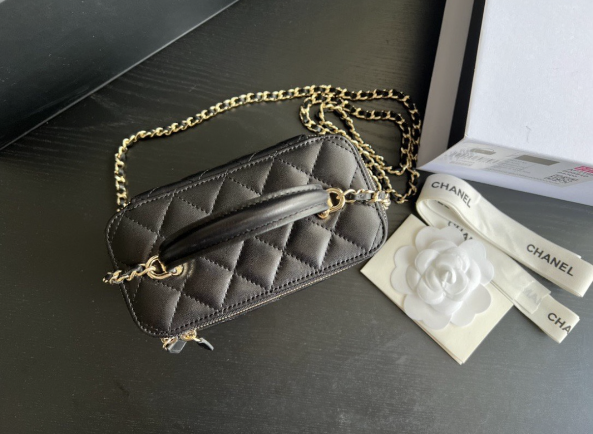 CHANEL Black Quilted Vanity Mini Crossbody with Gold
Hardware