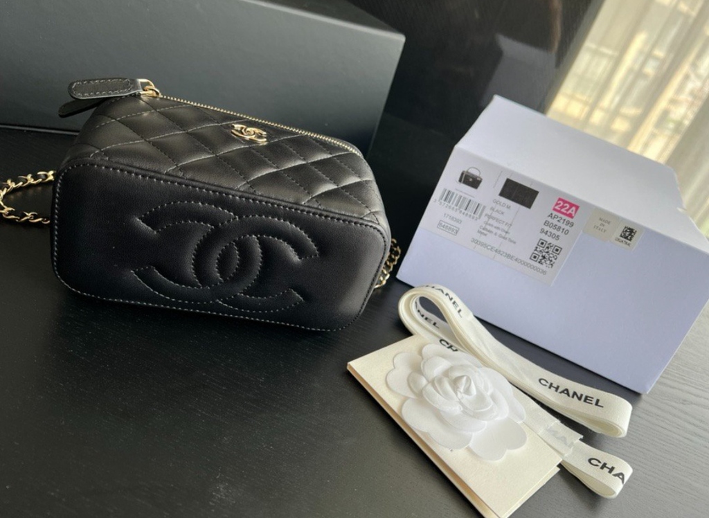 CHANEL Black Quilted Vanity Mini Crossbody with Gold
Hardware