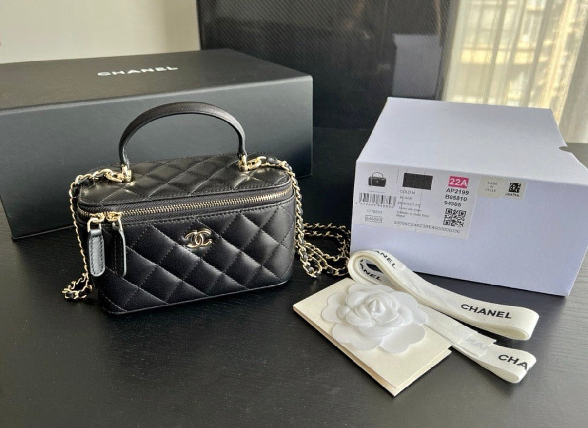 CHANEL Black Quilted Vanity Mini Crossbody with Gold
Hardware
