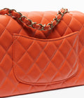 Chanel Lambskin & Gold-Tone Metal 
Dark Orange